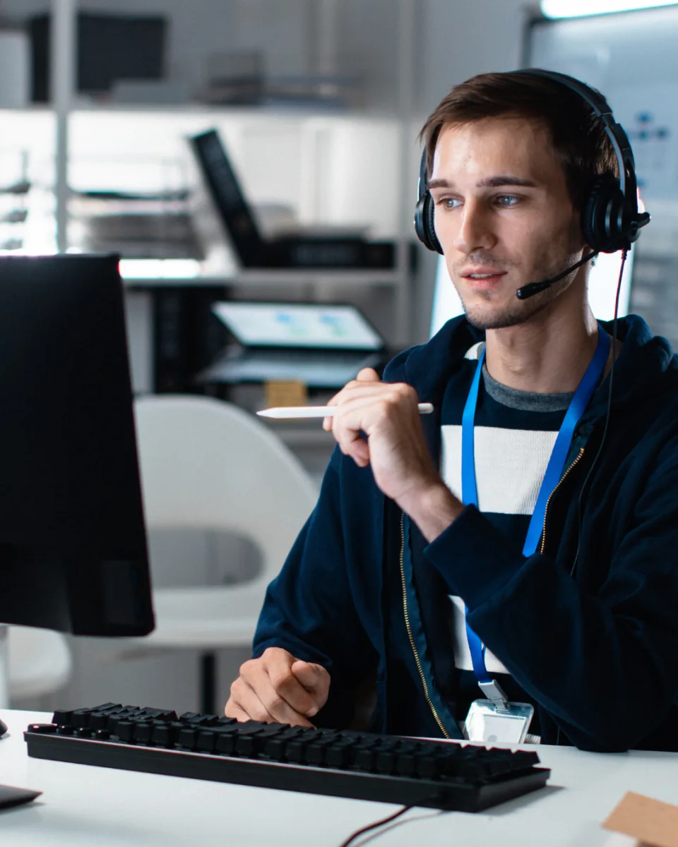 A specialist working through a filing at a desk